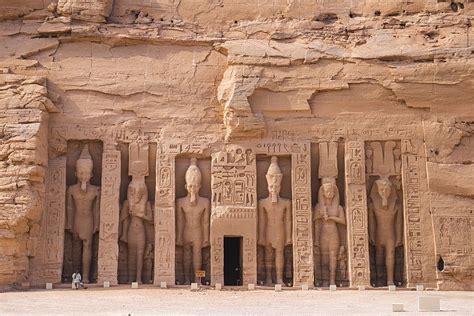 The small temple, dedicated to Nefertari and adorned with statues of ...