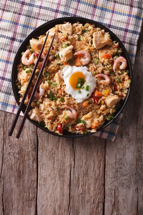 Nasi Goreng with Chicken, Prawns, Egg and Vegetables Vertical To Stock Image - Image of asian ...