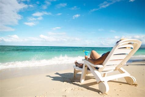 Woman Sitting on a Beach Chair Stock Image - Image of silence, private: 55661771