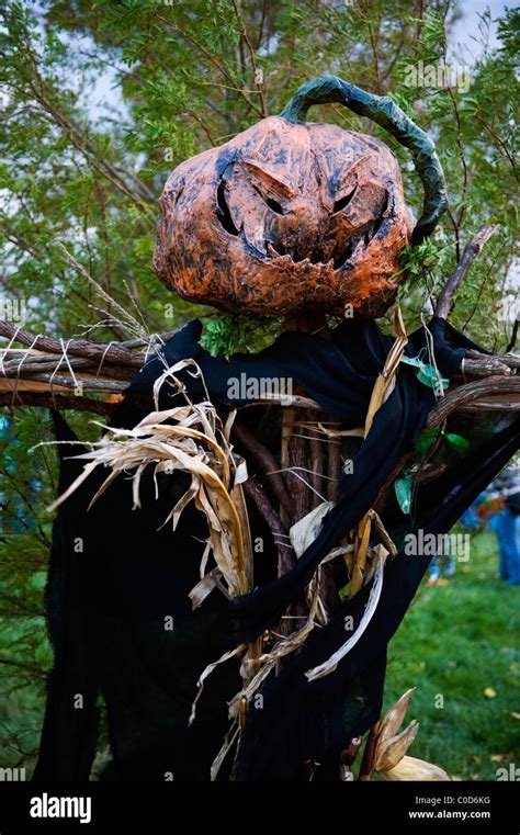 Scary Halloween pumpkin head scarecrow Stock Photo - Alamy