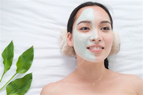 Premium Photo | Woman with a facial mask in a spa