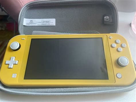 Nintendo Switch Lite - Yellow (comes with 3 games) | in Kennington, Kent | Gumtree