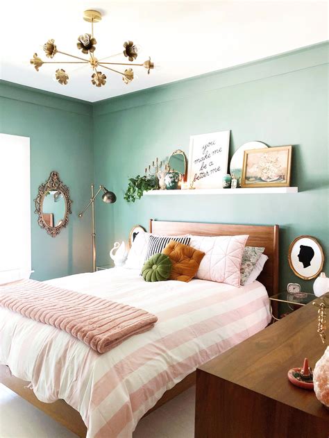 Pink and green bedroom decor. This room blends midcentury modern with glam details that look ...