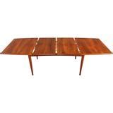 Danish Mid Century Modern Oval Teak Dining Table with One Pop Up Leaf at 1stDibs