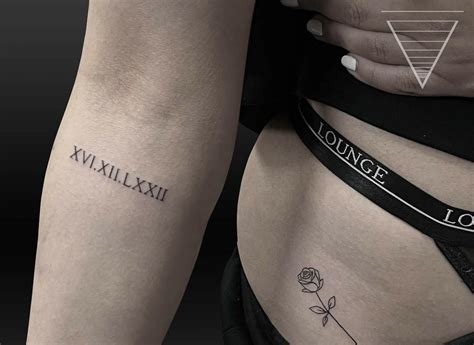 11+ Women's Roman Numerals Tattoo Ideas That Will Blow Your Mind!