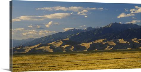 Sand dunes on a landscape, Great Sand Dunes National Monument, San Luis Valley, Colorado Wall ...