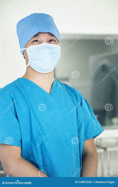 Portrait Of Young Surgeon Wearing Surgical Mask In The Operating Room Stock Photo - Image of ...