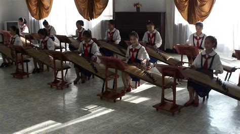 Children practicing playing the Gayageum - Pyongyang - North Korea - YouTube