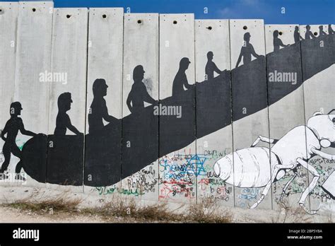 Palestine wall banksy hi-res stock photography and images - Alamy