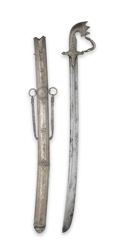 At Auction: A silver-mounted steel sword (saif) for the Yemeni market ...