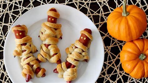 Walking Mummy Dogs | Recipe | Easy halloween food, Mummy dogs, Halloween food for party