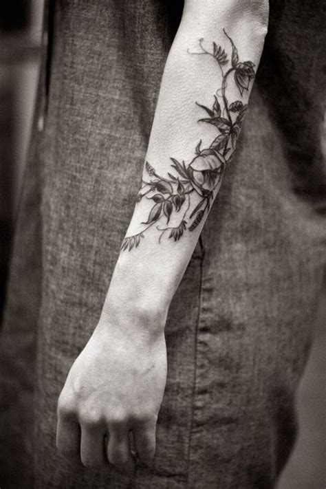 floral tattoo | Outer forearm tattoo, Botanical tattoo, Vine tattoos