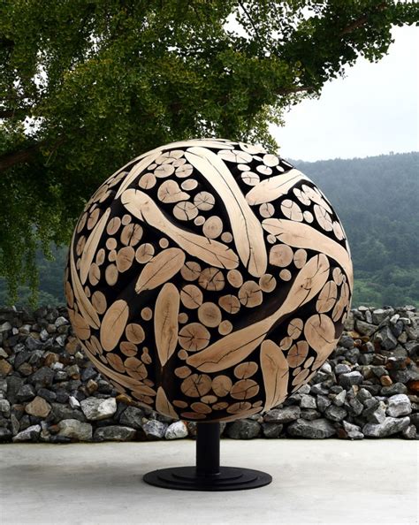 Wood sculptures created out of discarded tree trunks and branches ...