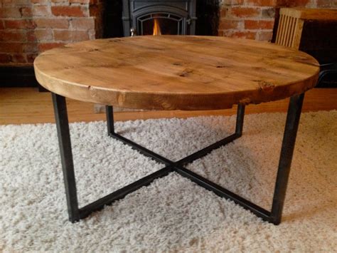 Reclaimed barn wood round coffee table with metal base