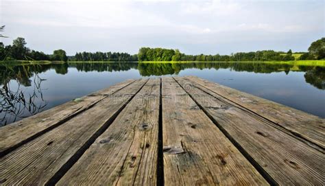 Boardwalk on the Lake stock image. Image of reflections - 18330381