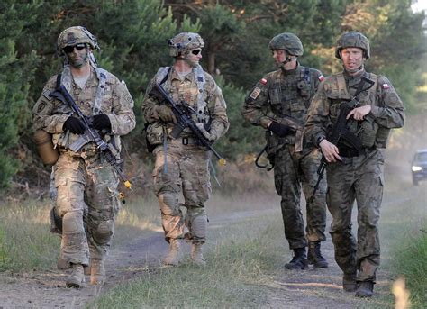 NATO troops in massive airborne exercise in Poland | The Seattle Times