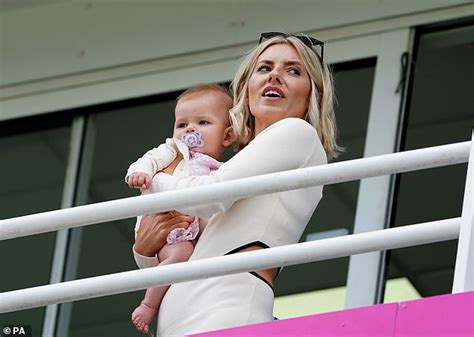 Mollie King dotes on daughter Annabella while cheering on cricketer ...