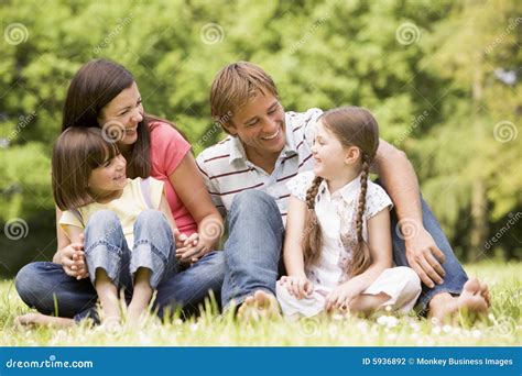 Family outdoors smiling stock photo. Image of relaxing - 5936892