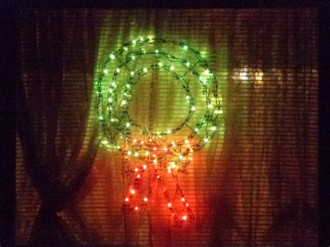 Christmas Wreath Lights in Window Picture | Free Photograph | Photos ...