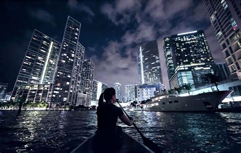 Miami: City Lights SUP or Kayak Night Tour | GetYourGuide