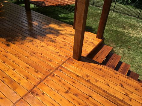 Two tone cedar deck. Cabot Stain Australian Oil. The posts and railing are getting two coats of ...