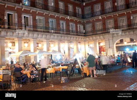 Spain, Madrid, Plaza Mayor, Restaurant at Night Stock Photo - Alamy