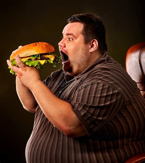 Fat Man Eating Fast Food Hamberger. Breakfast for Overweight Person. Stock Image - Image of ...