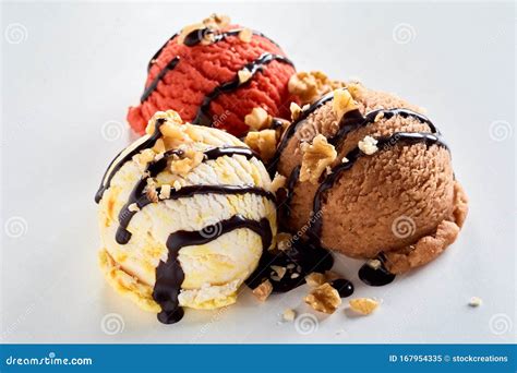 Ice Cream Dessert Topped with Nuts and Chocolate Stock Image - Image of ...