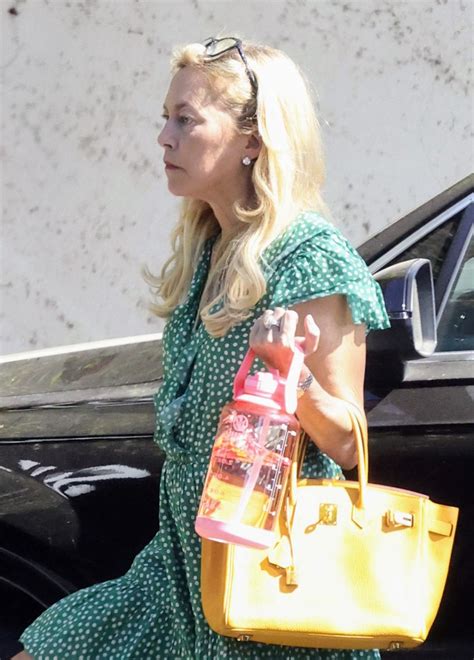 SUTTON STRACKE Headed to Her Fashion Boutique Office 08/01/2023 ...