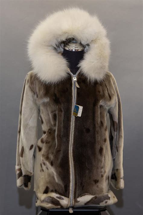 Sold Price: A seal skin jacket with white fur trim, - November 5, 0119 1:00 PM PST