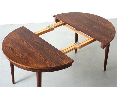 Round Hans Olsen Rosewood Dining Table with Extension Leaf at 1stDibs