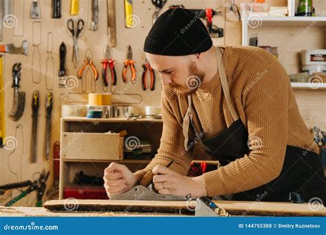 Carpenter is Making Furniture on Order in a Workshop Stock Photo - Image of manufactory ...