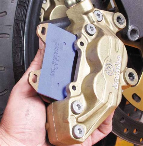 How to Change Motorcycle Disc Brake Pads | MC GARAGE | Brake pads, Bike ...