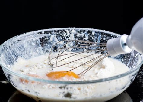 Add Eggs and Flour To a Transparent Bowl for Making Batter. Stock Photo - Image of powder, glass ...