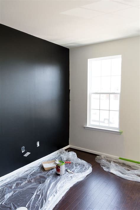 Our Tricorn Black accent wall and choosing a complementary gray | Black accent wall living room ...