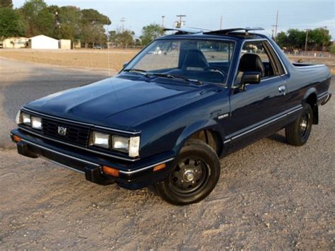 1986 Subaru Brat, runs well, excellent body, paint, and interior, cold AC