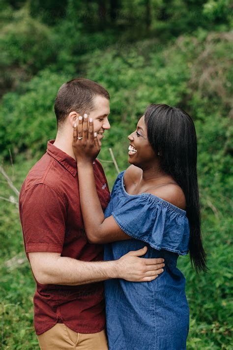 "Portrait Of Happy Interracial Couple" by Stocksy Contributor "Leah Flores" - Stocksy