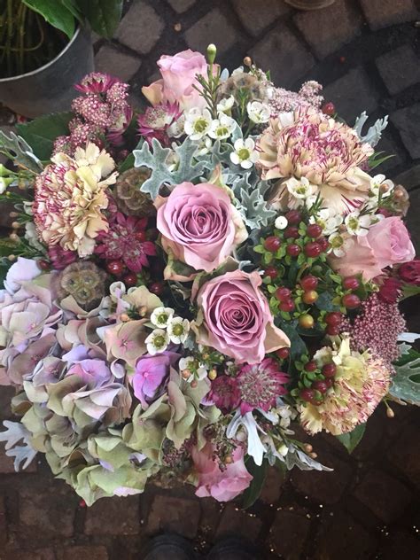 Pale bouquet using wax flower, roses, hydrangea, carnations and senecio Wax Flowers, Carnations ...