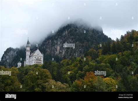 An aerial view of Neuschwanstein Castle against the cloudy sky Stock ...