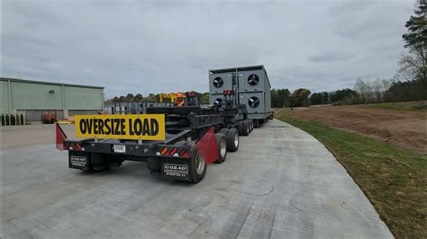 Cozad 80 Ton Stretch Steerable Trailer Loaded - Backing To Park - YouTube