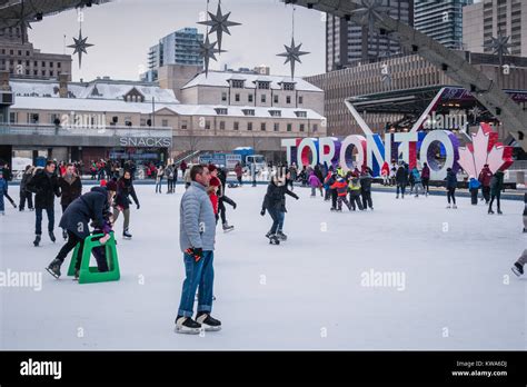 toronto nathan phillips square winter people skating Stock Photo - Alamy