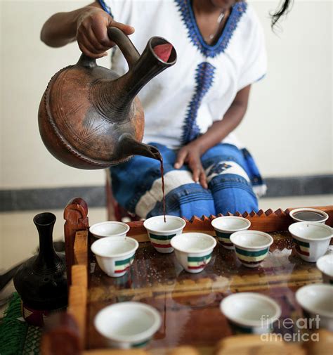 hand pouring Ethiopian coffee during coffee ceremony Photograph by John Wollwerth | Fine Art America