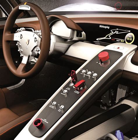 the interior of a modern car with steering wheel and dashboard controls ...