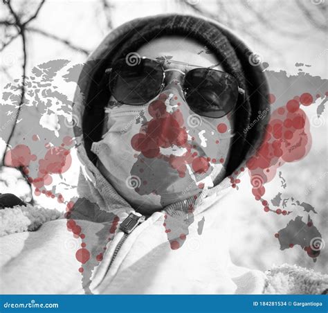 Portrait of a Citizen with the Protective Mask and Glasses and a World Map with Corona Virus ...