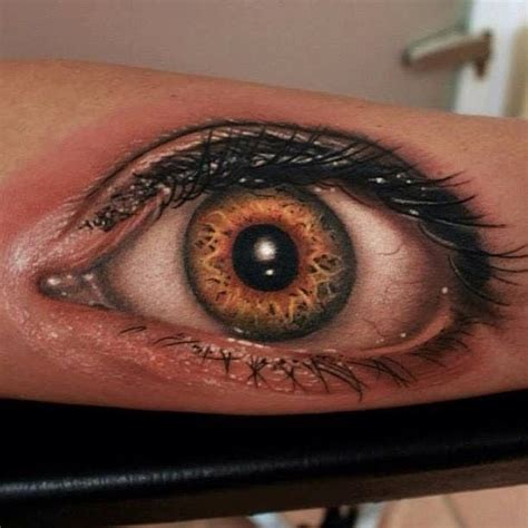 Adorable realistic eye tattoo on arm