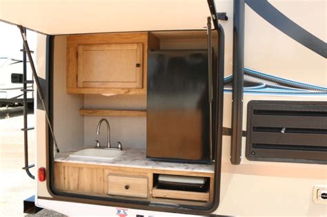 9 Best Travel Trailers With Outdoor Kitchens - Survival Tech Shop