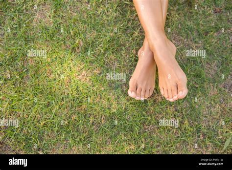 Barefoot grass woman hi-res stock photography and images - Alamy