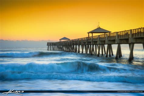 Waves at the Juno Beach Pier | Royal Stock Photo