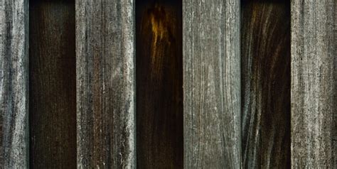 Premium Photo | A dark brown wooden wall