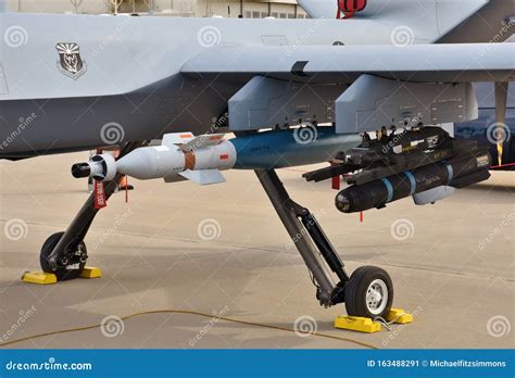 AGM-114 Hellfire Missile and a GBU-12 Laser Guided Bomb Editorial Photo - Image of predator ...